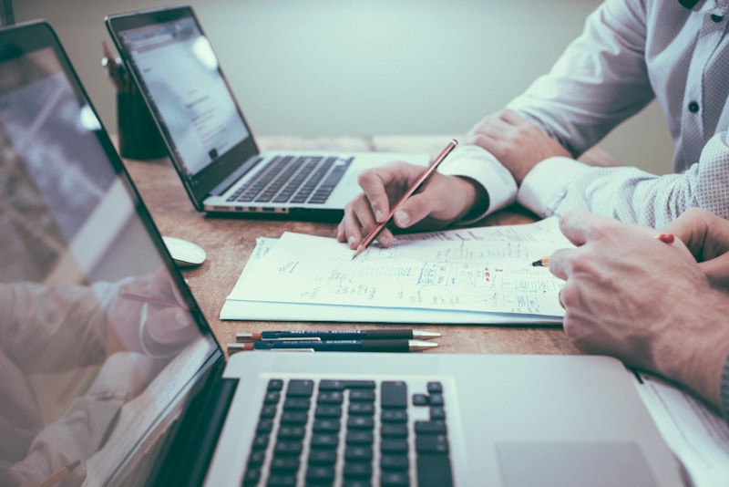 Charts and analysis materials used to evaluate business outcomes